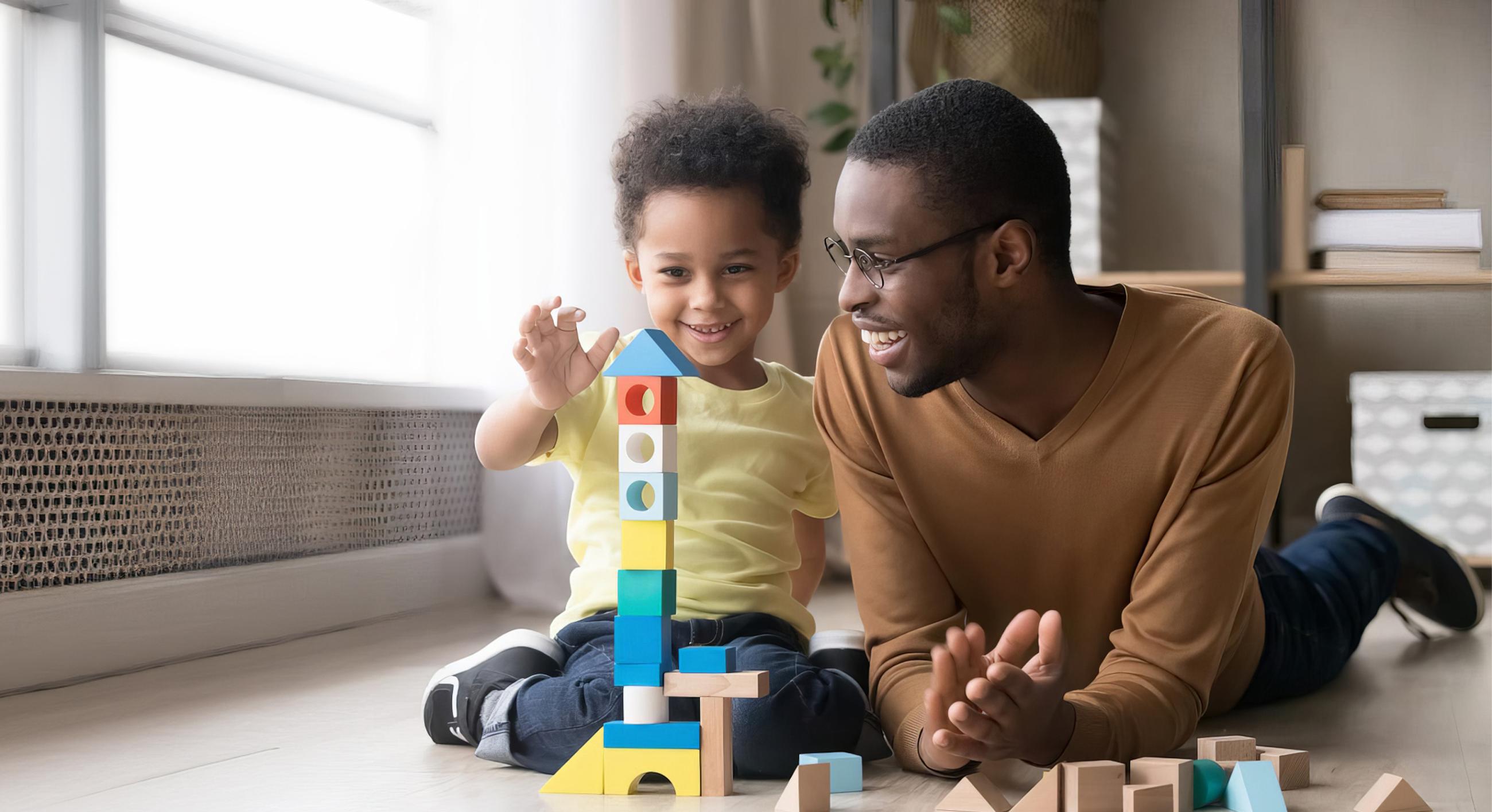 Dad playing with boy